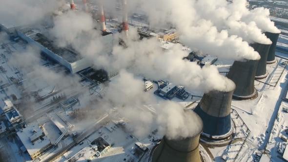 Smoke and Steam From Chimneys at a Thermal Power Station. Drone Shot. alt