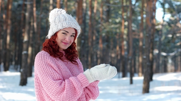 Portrait of a Girl Holds a Cup of Tea, Hands in Knitted Gloves Gives a Hot Drink