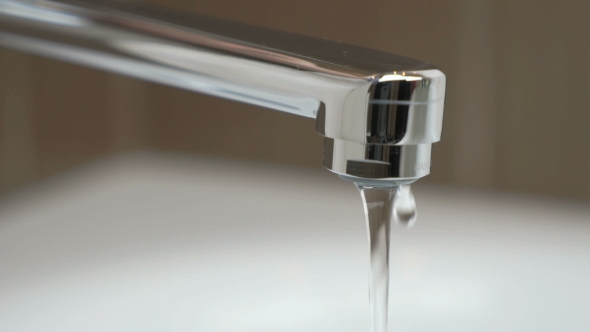 Water Under Weak Pressure Flows From a Water Tap alt