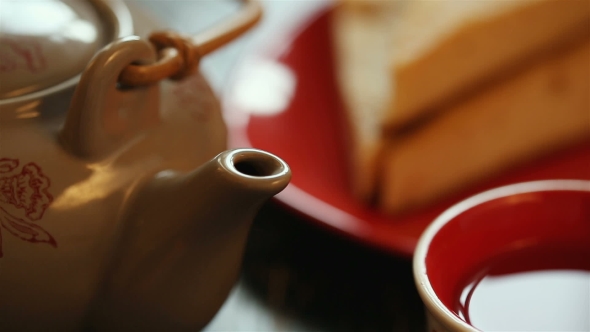 Black Tea and Cake. Morning Composition on the Table for the Background