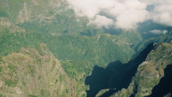 Aerial View of the Canyon and Mountains with Clouds