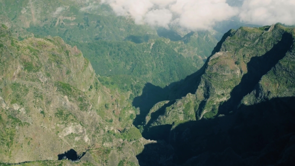 Aerial View of the Canyon and Mountains with Clouds