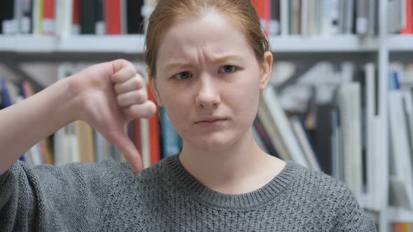 Thumbs Down by Female, Disliking and Rejecting at Home alt