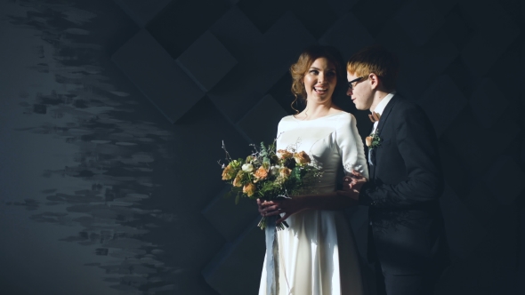 Married Couple Kissing And Smiles Each Other Before Wedding Ceremony By