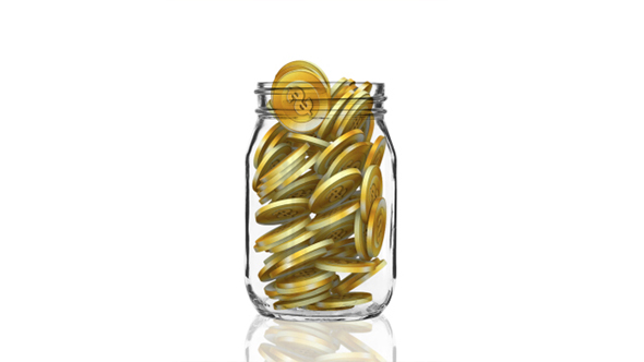 Coins In a Jar - Growing Savings Concept