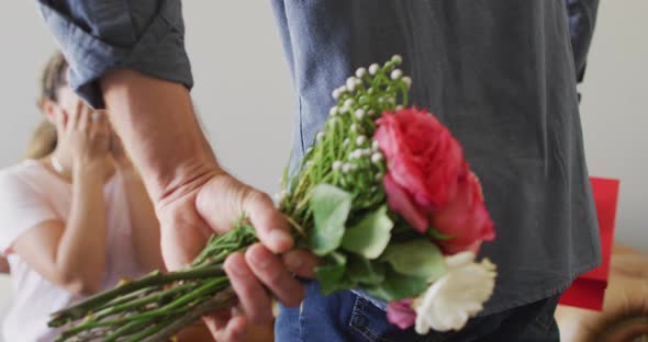 Happy young caucasian couple in love spending valentines day at home alt