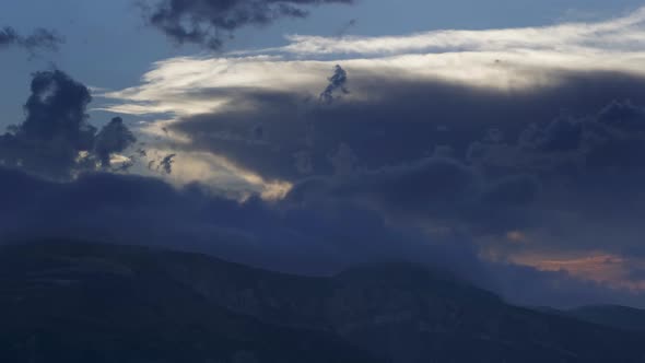 Mountain After Sunset in Clouds
