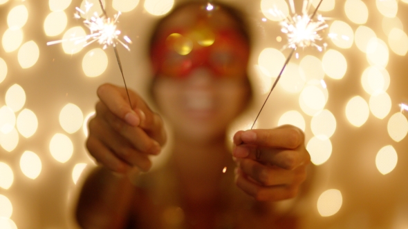 Beautiful Young Woman Wearing Carnival Mask on New Year Party alt