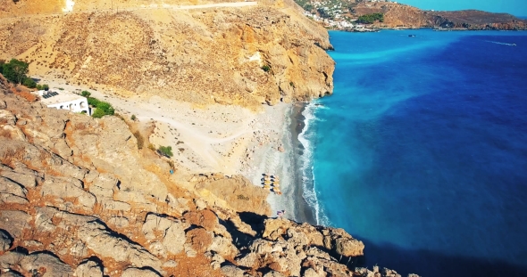 Blue Sea, Waves Breaking in Cliffs at Shore