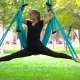 Girl in a Park Engaged in Aerial Yoga - VideoHive Item for Sale