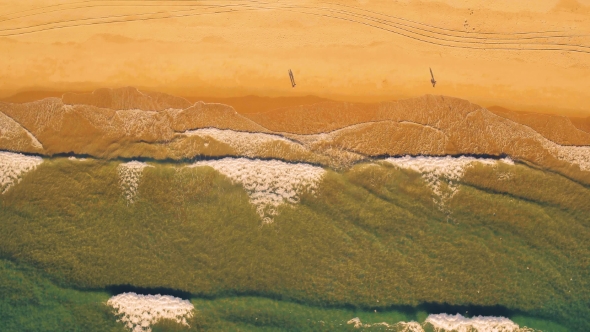 Aerial View Small Waves on Sandy Beach