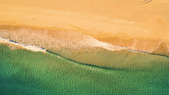 Aerial View Small Waves on Sandy Beach