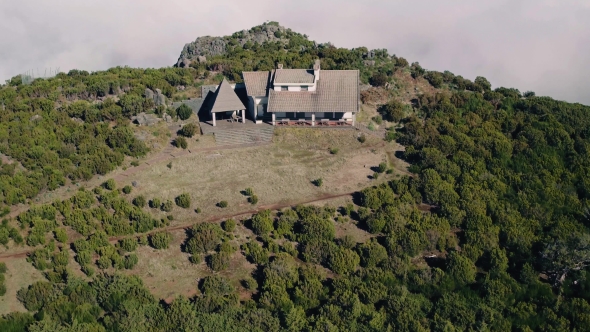 Aerial View of the Abandoned House on Top Mountain