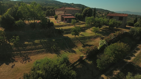Holiday House and Olive Trees in Tuscany on Sunny Day alt