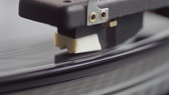 Old Vinyl Turntable Playing Music