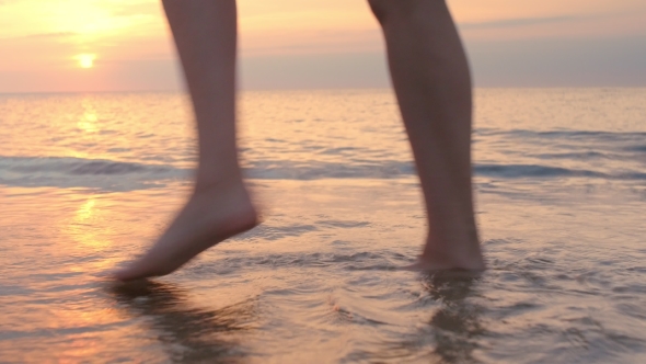 Feet Running on the Beach