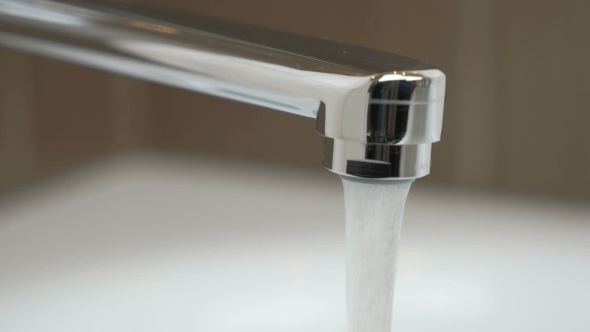 Water Flows Strong Stream of Chrome-plated Faucet