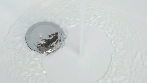 Filling of Water Into White Bathtub