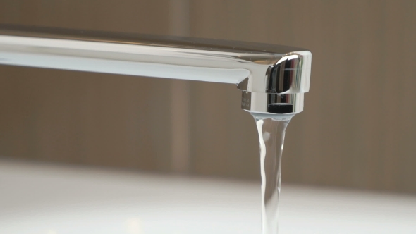 Water Under Weak Pressure Flows From a Water Tap alt