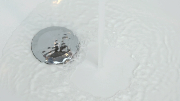 Filling of Water Into White Bathtub alt