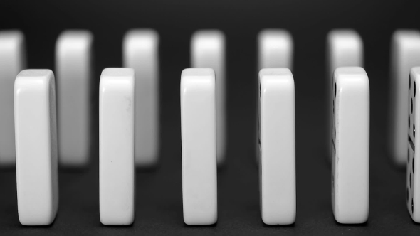 Built Figure of Dominoes Falling in alt