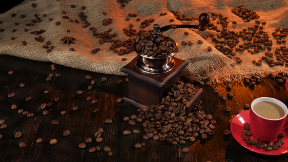 Antique Coffee Mill on Table with Two Cups of Latte alt