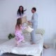 Portrait of Family Fighting Pillows, Jumping on - VideoHive Item for Sale