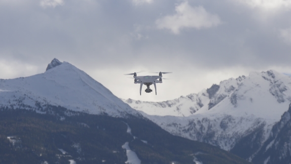Drone Flies Away To Mountains