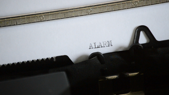 Typing the Word ALARM with an Old Manual Typewriter alt