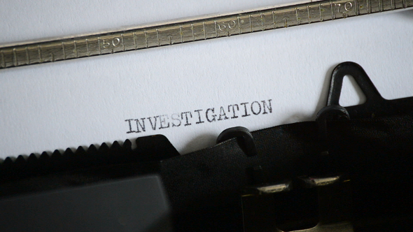 Typing the Word INVESTIGATION with an Old Manual Typewriter alt