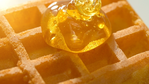 Honey Dripping Down a on Waffle