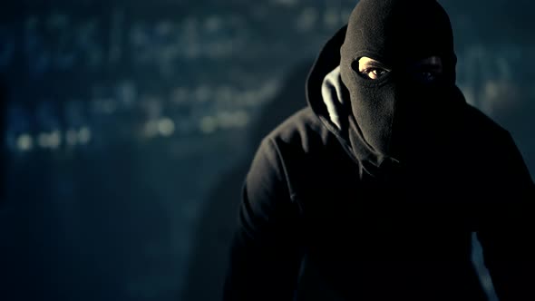 Caucasian Hacker in Mask alt