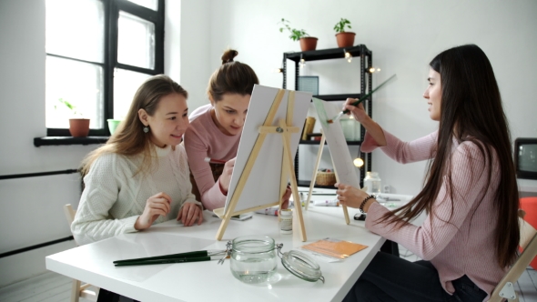Group of Students Painting at Art Lessons
