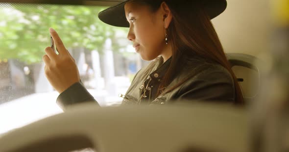 Teenage girl taking photo with mobile phone 4k alt