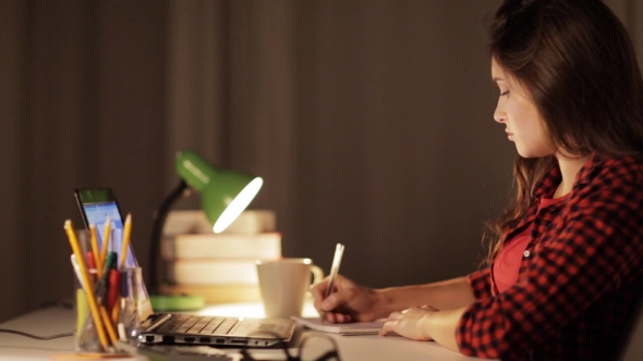 Student Girl with Laptop and Notebook at Home 62 alt