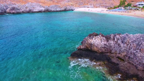 Blue Sea, Waves Breaking in Cliffs at Shore