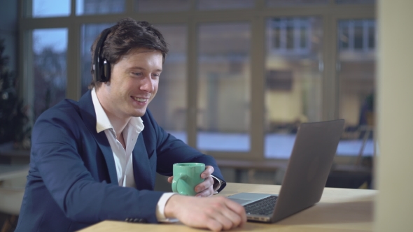 Portrait Adult Man Listen Music Indoors.