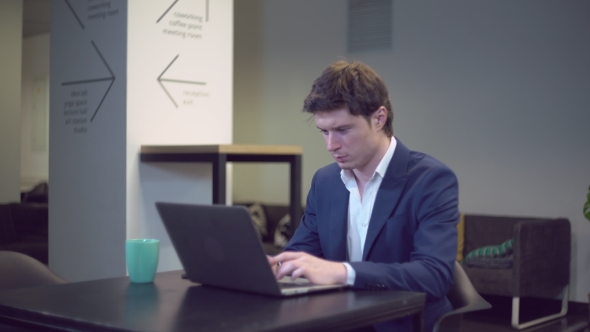 Portrait Handsome Man in Office. alt