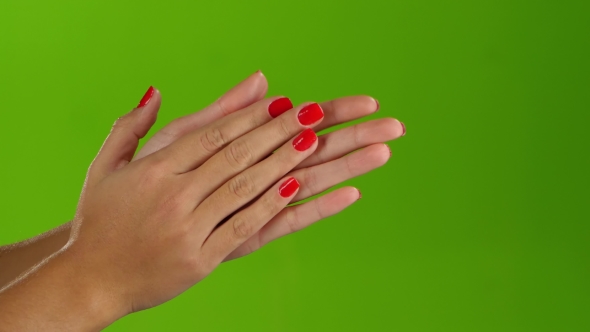 Woman Doing Claps Her Hands on a Green Screen Background alt