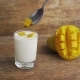 Process of Making a Homemade Yogurt with Fresh Mango Slices - VideoHive Item for Sale