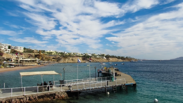 Beach in Egypt. Resort in Red Sea Coast and Pier alt