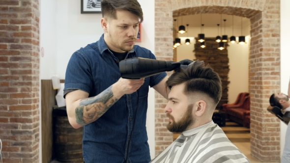VideoHive Barber Getting Groomed at Hairdresser with Hair Dryer While Sitting in Chair at Barbershop 19618240 VideoHive Barber Getting Groomed at Hairdresser with Hair Dryer While Sitting in Chair at Barbershop 19618240