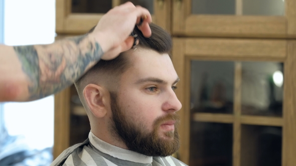 VideoHive Portrait of Attractive Young Man Getting Trendy Haircut Male Hairdresser Serving Client 19618382 VideoHive Portrait of Attractive Young Man Getting Trendy Haircut Male Hairdresser Serving Client 19618382