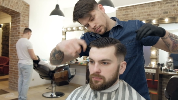 VideoHive Barber Style Male Barber in Plaid Shirt Combing Hair of a Male Client at Barbershop 19620466 VideoHive Barber Style Male Barber in Plaid Shirt Combing Hair of a Male Client at Barbershop 19620466