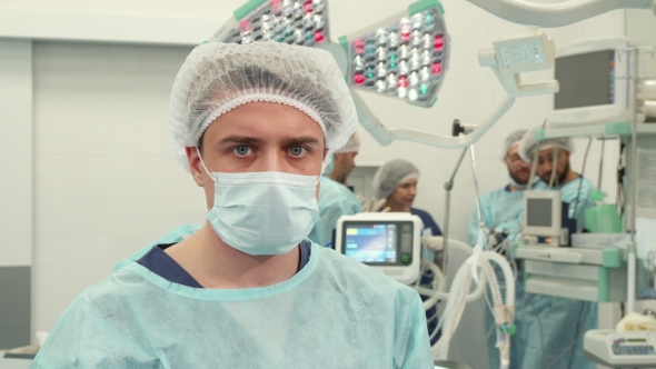 Surgeon Poses at the Surgery Room alt
