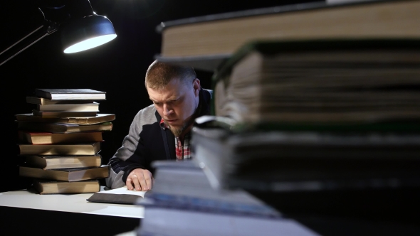 Man Finds Information That Was Looking for and Was Glad. Black Background alt