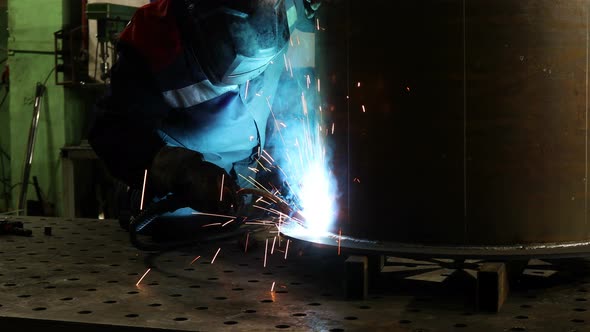 Metalworker Welding at The Factory
