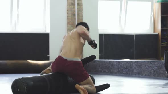 Professional Mma Fighter Practicing Grappling and Punching at the Gym 1080p alt