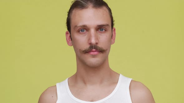 Thin Man with Blue Eyes Showing Surprise and Expressing Lack of Information Closeup alt