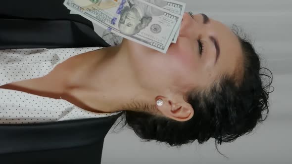 Vertical Video of Woman Displaying Cash
